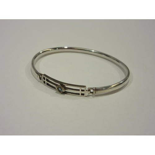 1318 - A Rennie Mackintosh design silver bangle, boxed