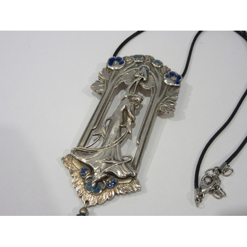1346 - A plated Art Nouveau oversized pendant, blue enamel flowers, female figure pendant hung with a lapis... 