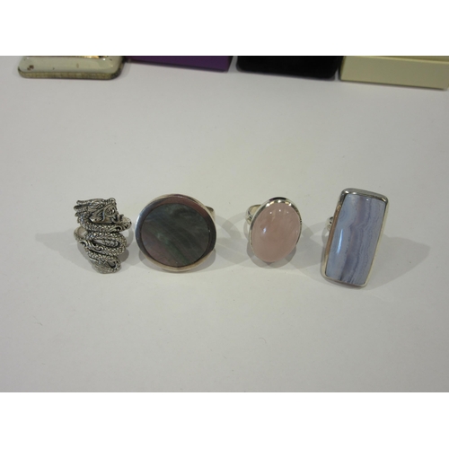 1347 - Four dress rings - rose quartz, agate, shell and dragon form stamped 925