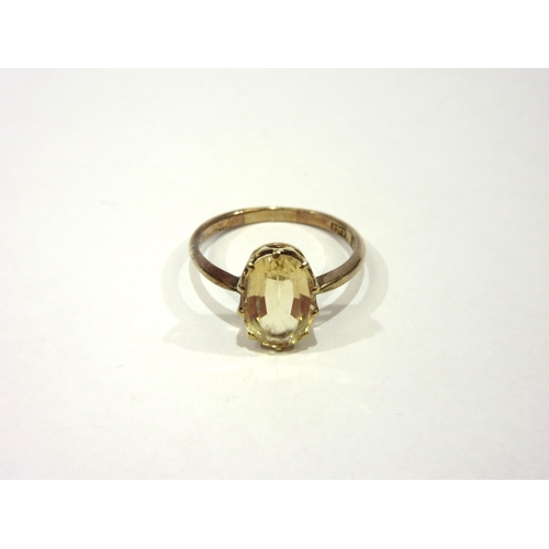 1350 - A 9ct gold ring inset with citrine