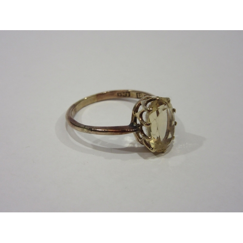 1350 - A 9ct gold ring inset with citrine