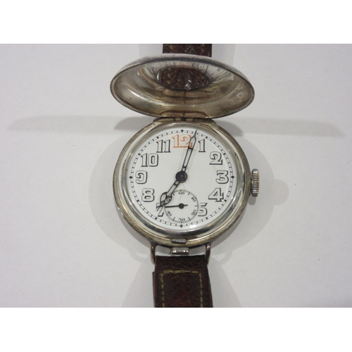 1357 - An early 20th Century silver half-hunter Trench watch on leather strap, white dial with Arabic numer... 