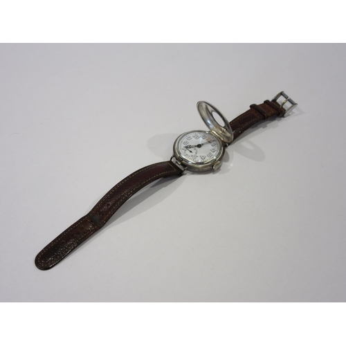 1357 - An early 20th Century silver half-hunter Trench watch on leather strap, white dial with Arabic numer... 