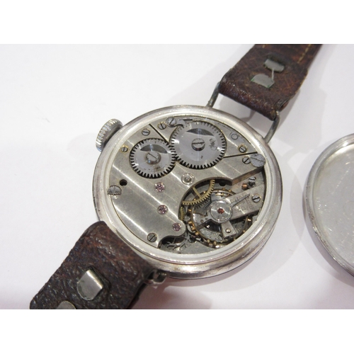 1357 - An early 20th Century silver half-hunter Trench watch on leather strap, white dial with Arabic numer... 