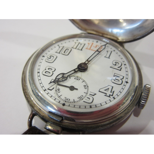 1357 - An early 20th Century silver half-hunter Trench watch on leather strap, white dial with Arabic numer... 