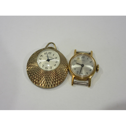 1360 - Two lady's wristwatch faces including one 9ct, a Sekonda watch lady's pendant and a silver engraved ... 
