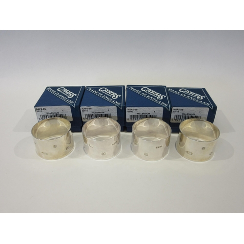1380 - A set of four silver napkin rings, Carrs silverware 