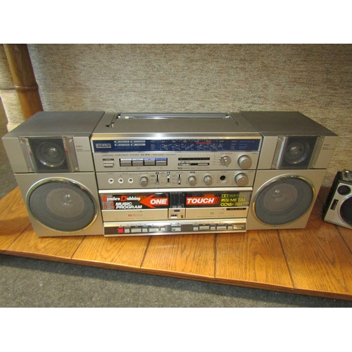 1144 - A vintage Aiwa CA-W10 cassette/radio ghetto blaster (damage to top) and a smaller Sanyo example (2)