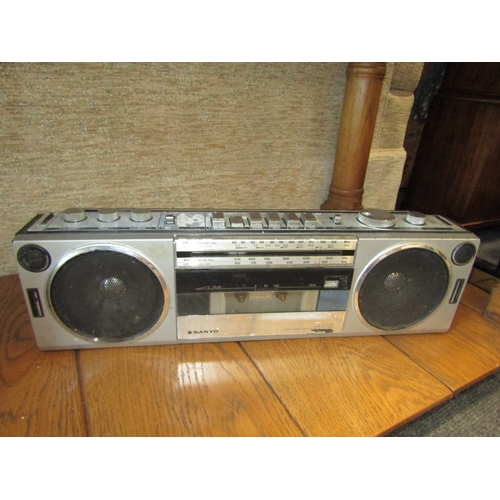 1144 - A vintage Aiwa CA-W10 cassette/radio ghetto blaster (damage to top) and a smaller Sanyo example (2)