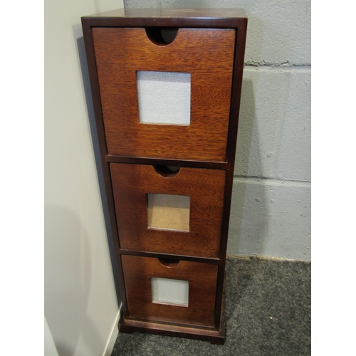1313 - A mahogany three drawer storage box, a jewellery box and another (3)