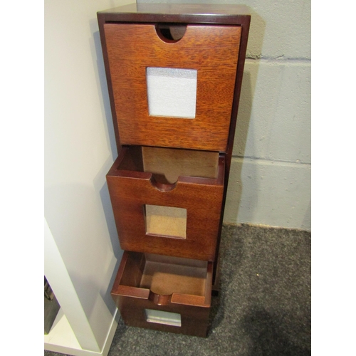 1313 - A mahogany three drawer storage box, a jewellery box and another (3)