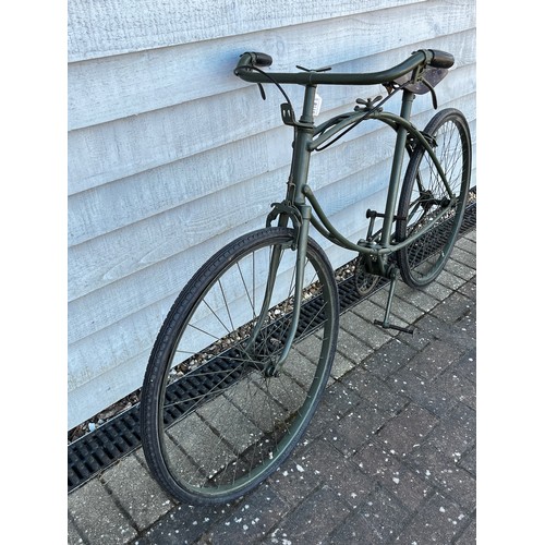 8118 - A BSA folding paratrooper / airborne forces bicycle, green painted frame with brown leather saddle. ... 