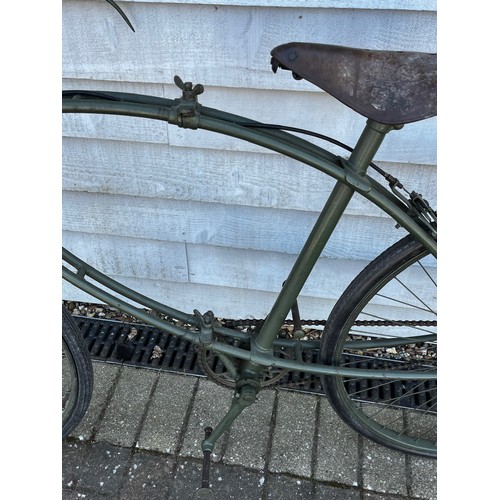 8118 - A BSA folding paratrooper / airborne forces bicycle, green painted frame with brown leather saddle. ... 