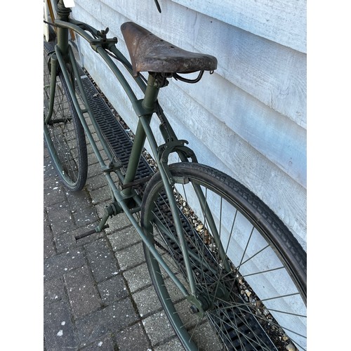 8118 - A BSA folding paratrooper / airborne forces bicycle, green painted frame with brown leather saddle. ... 