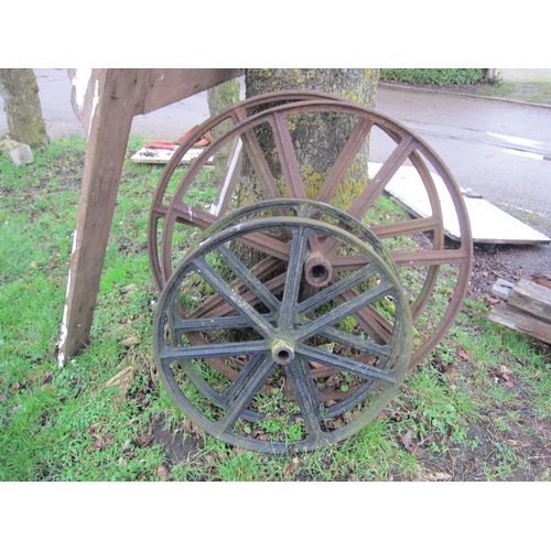 9060 - A set of four iron shepherd hut wheels; one pair 30.5