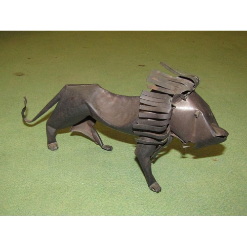 4044 - A tin plate model of a lion together with a painted model of a Porcupine, tallest 17cm (2)