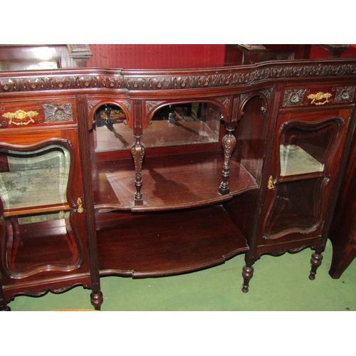 4024 - A circa 1900 mahogany sideboard, central alcove flanked by two glazed cabinets, 208cm tall x 152cm w... 