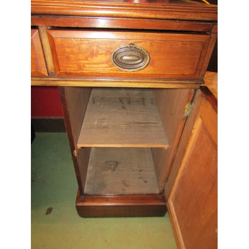 4001 - A circa 1900 pine and walnut twin pedestal writing desk, the tooled leather writing surface over thr... 