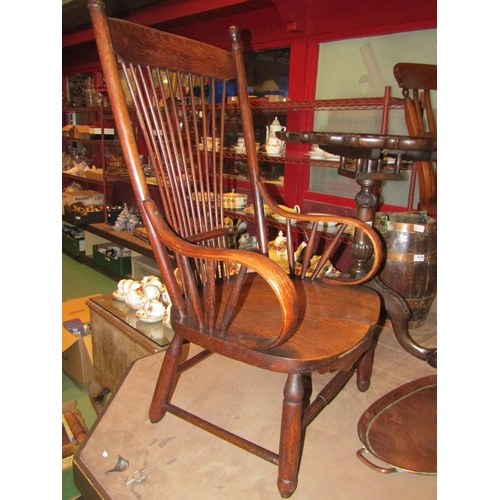4005 - An Arts & Crafts oak and bentwood high back nursing armchair with turned decoration