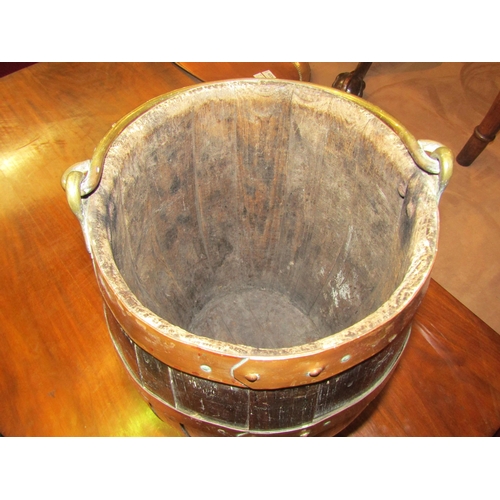 4008 - A coopered oak barrel with handle, 41cm tall