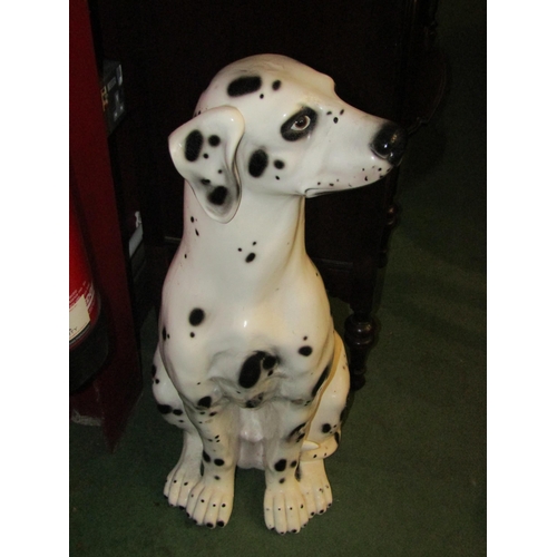 4020 - A resin seated Dalmatian statue, approximately 71cm tall