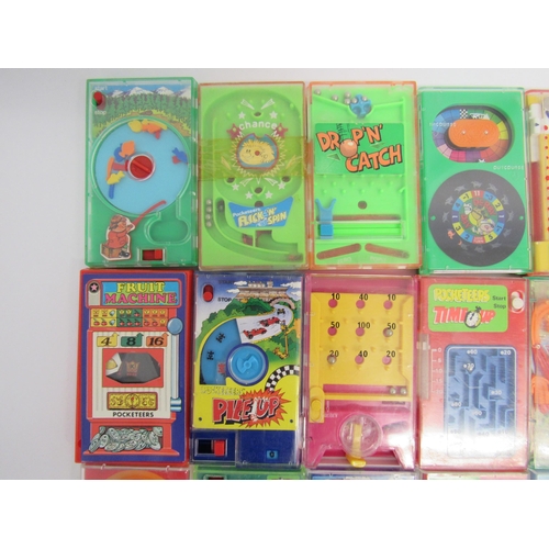 9017 - Twenty-six 1970s Tomy Pocketeers handheld dexterity games and seven Top Trumps card games (33)