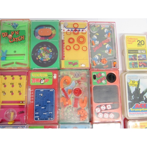 9017 - Twenty-six 1970s Tomy Pocketeers handheld dexterity games and seven Top Trumps card games (33)