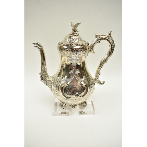 8009 - A Martin, Hall & Co. Victorian silver four piece tea set of highly ornate form.  Both pots lids are ... 