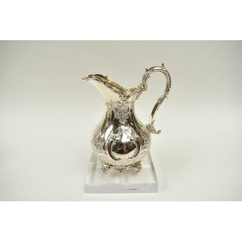 8009 - A Martin, Hall & Co. Victorian silver four piece tea set of highly ornate form.  Both pots lids are ... 