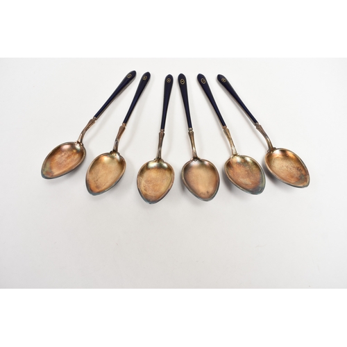 8041 - Henry James Hulbert cased set of six silver gilt and guilloche teaspoons one with damage to end of h... 