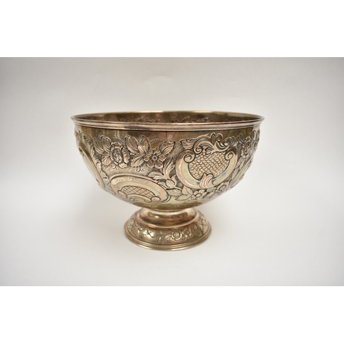 8019 - A London silver presentation bowl with embossed floral detail.  One cartouche is engraved with the H... 