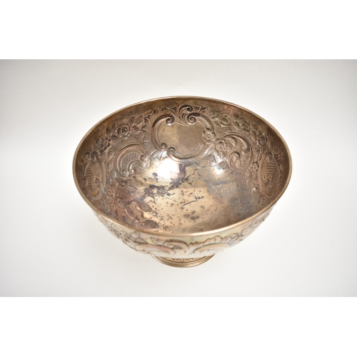 8019 - A London silver presentation bowl with embossed floral detail.  One cartouche is engraved with the H... 