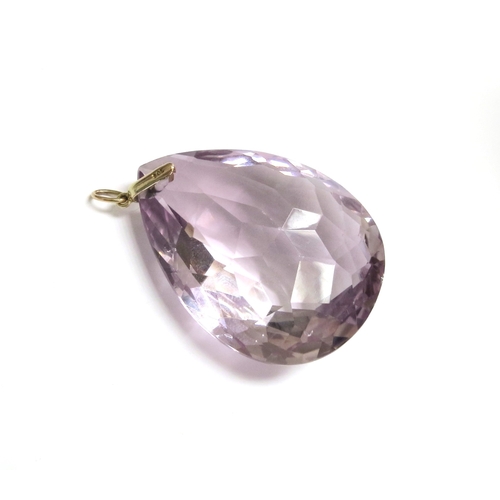 6046 - A large tear drop shaped facet cut amethyst pendant, 5cm x 4cm, 9ct gold pendant mount