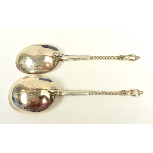 8050 - A cased set of two William Hutton and Sons Ltd Apostle spoons both with monogram to the underside of... 