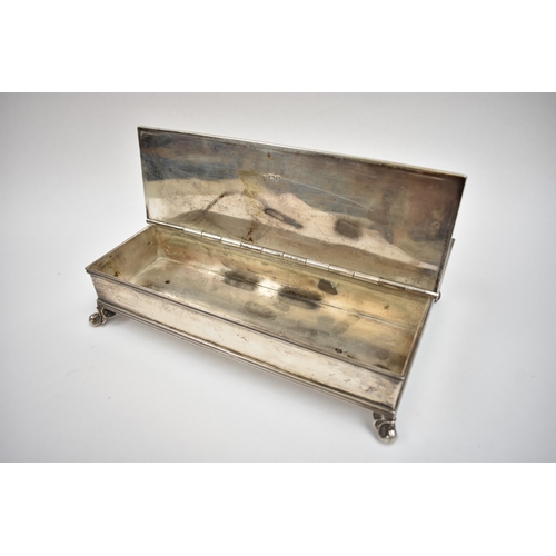8026 - A Lambert and Co silver table top cigar and cigarette compendium with integral ashtrays. The swing h... 