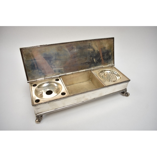 8026 - A Lambert and Co silver table top cigar and cigarette compendium with integral ashtrays. The swing h... 