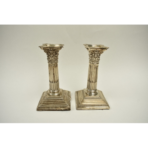 8013 - A pair of Victorian Harrison Brothers & Howson silver Corinthian column candlesticks with multiple s... 