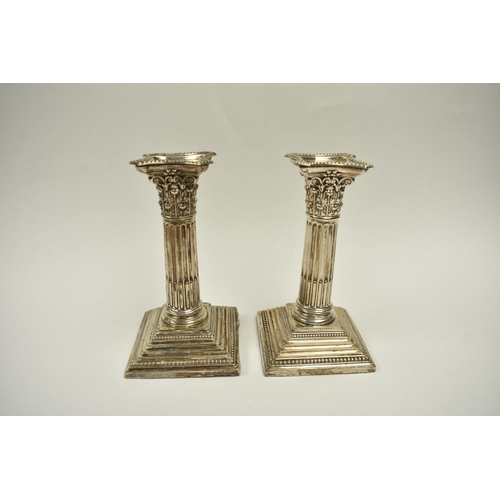8013 - A pair of Victorian Harrison Brothers & Howson silver Corinthian column candlesticks with multiple s... 