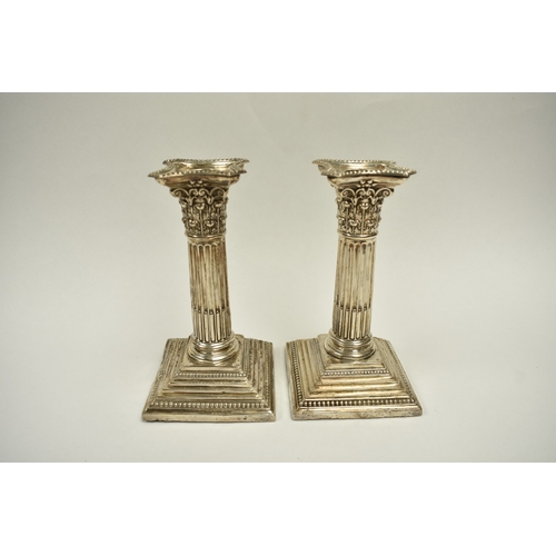 8013 - A pair of Victorian Harrison Brothers & Howson silver Corinthian column candlesticks with multiple s... 