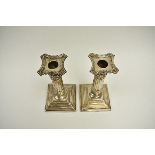8013 - A pair of Victorian Harrison Brothers & Howson silver Corinthian column candlesticks with multiple s... 