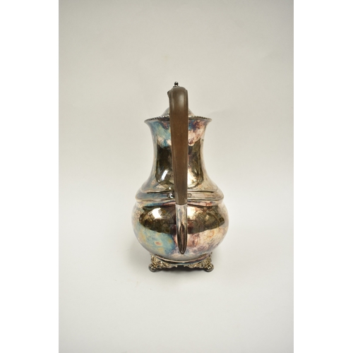 8010 - An Atkin Brothers silver coffee pot with engraved monogram to side, treen knop and handle, raised on... 