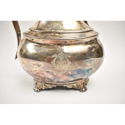 8010 - An Atkin Brothers silver coffee pot with engraved monogram to side, treen knop and handle, raised on... 