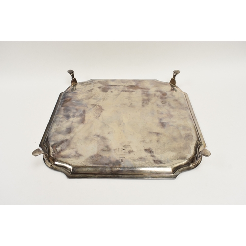 8030 - A Hawksworth, Eyre & Co Ltd silver square form salver raised on four feet with shaped corners, Londo... 