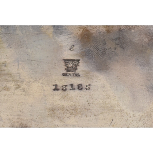 8030 - A Hawksworth, Eyre & Co Ltd silver square form salver raised on four feet with shaped corners, Londo... 