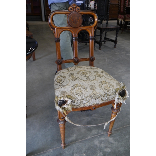 2001 - A pair of Victorian walnut Aesthetic movement chairs with inlaid butterflies, seats for recovering