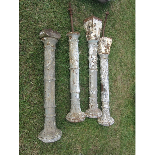 Four decorative cast iron 19th Century conservatory posts