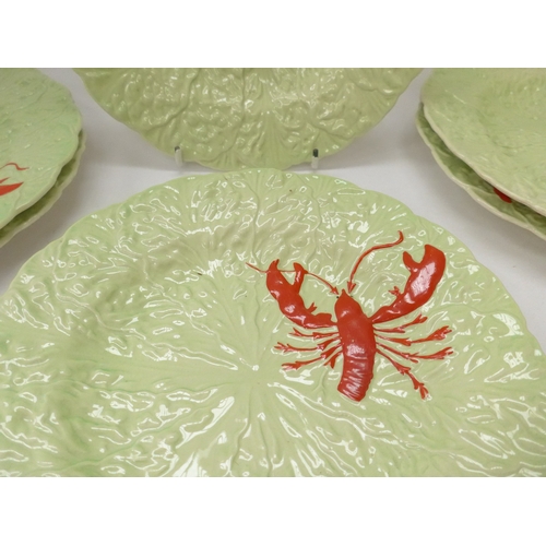 8061 - A set of six Carlton Ware Lobster plates with relief moulded designs. 23cm diameter