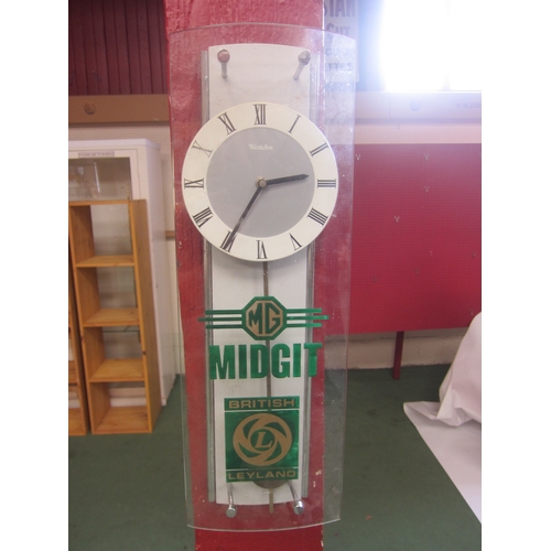 7062 - A Westclox battery movement wall clock with added hand-painted MG Midget, British Leyland detailing
