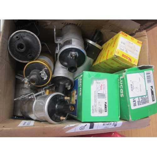7102 - A box of 11 coils including boxed Lucas and Bosch examples