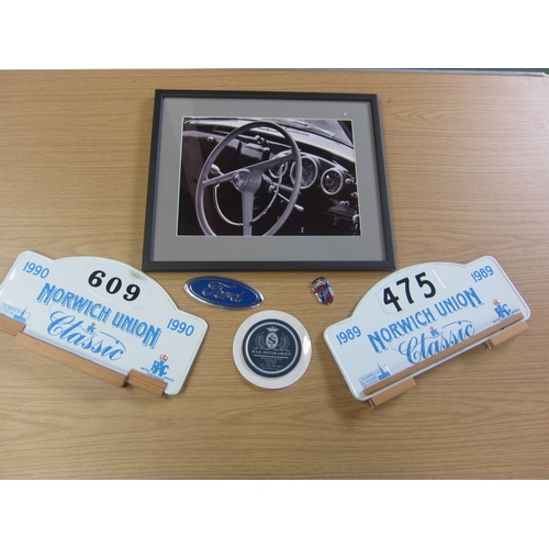 7067 - A quantity of information cards covering various Marques, a tax disc holder, a Ford Ghia badge and a... 